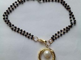 hand-mangalsutra-bracelet-pearl-frame2-1486129304izo